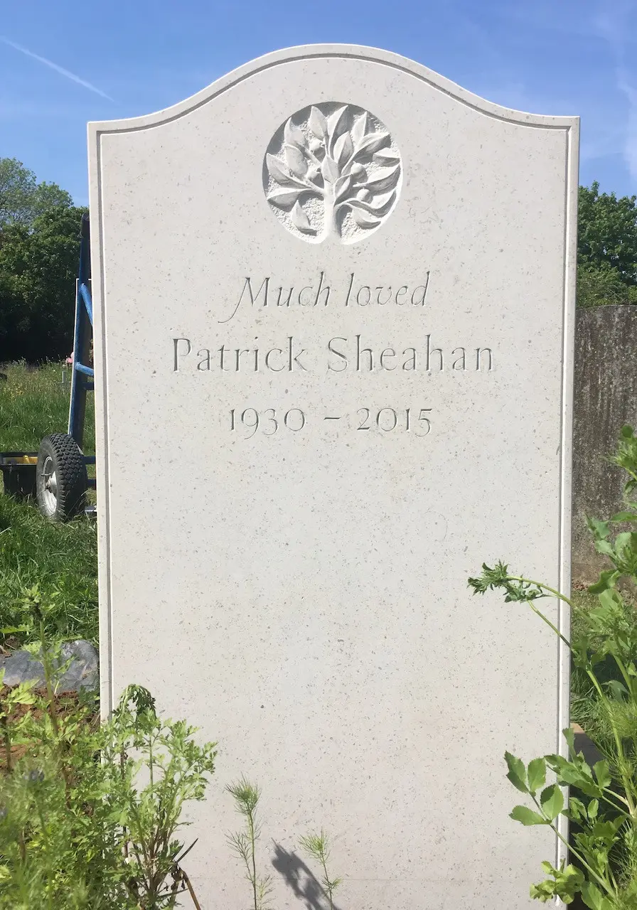 tree carving headstone