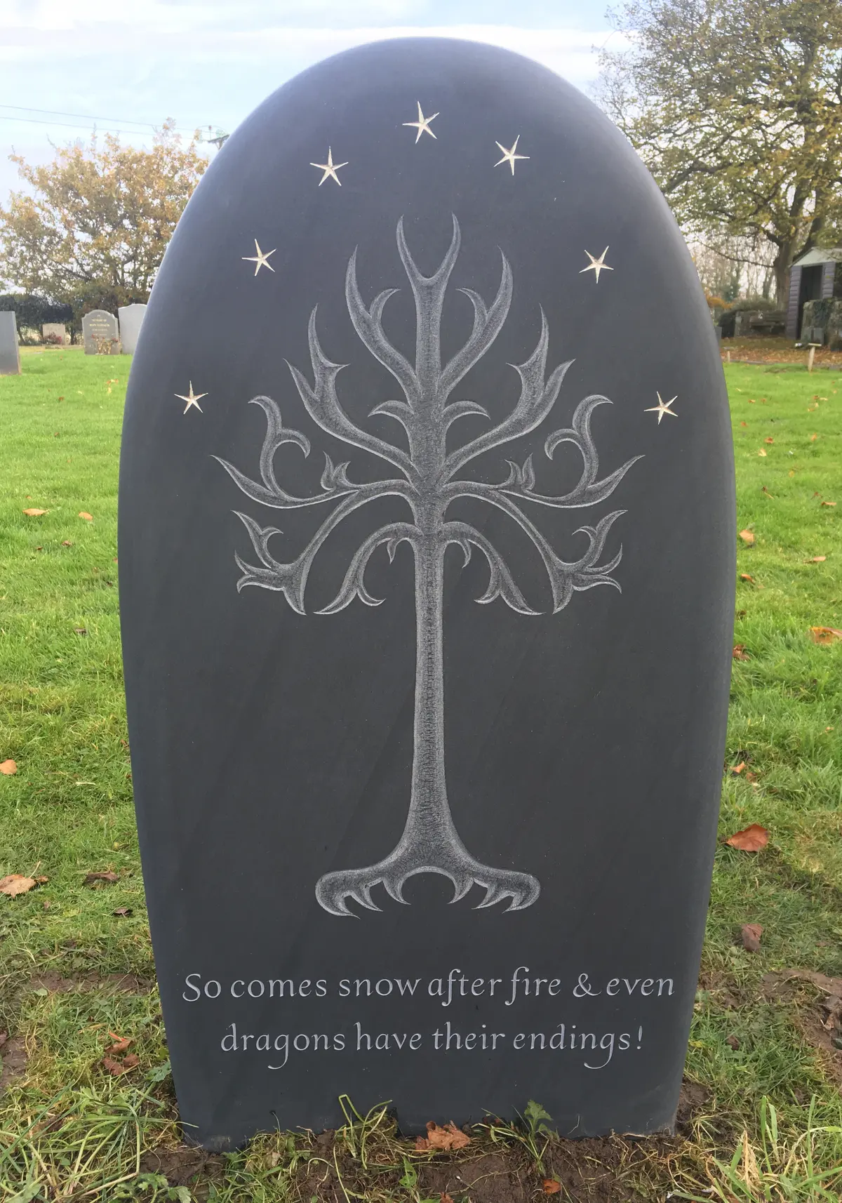 headstone in slate with tree