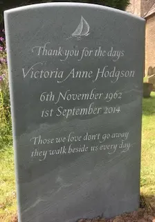 hand carved headstone marker