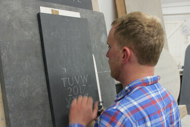 cutting letters in stone