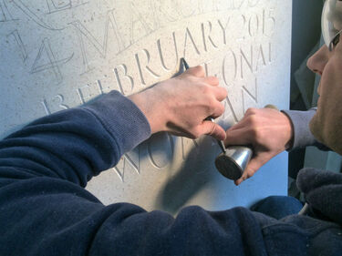 carving letters in stone