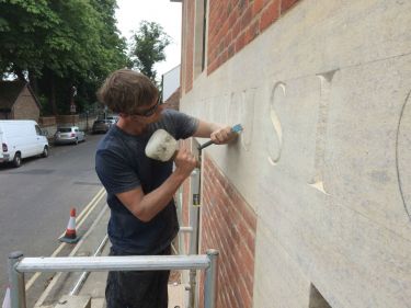 Fergus carving inscription at St Edward's School, Oxford