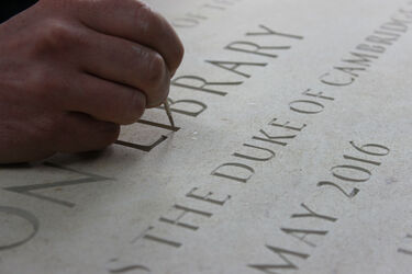 painting lettering in stone