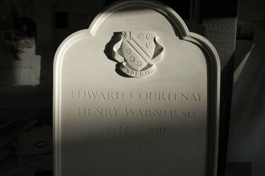 crest on portland gravestone