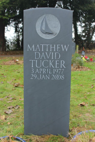 Slate headstone with carving