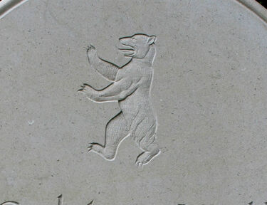 symbol of bear on gravestone