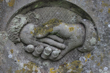 clasped hands symbol on graveston