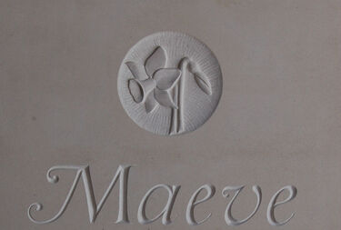 daffodil carving on headstone
