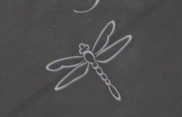 dragonfly symbol headstone