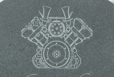 engine carved onto headstone