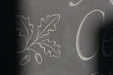 oak leaves on gravestone