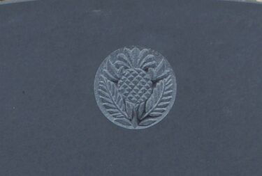 thistle symbol on gravestone