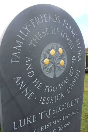 Headstone with golden apples
