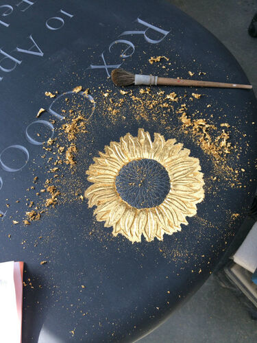 gilding a headstone