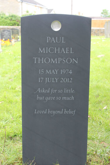 Beautiful slate headstone with disc