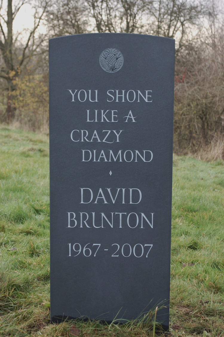 unique slate headstone with relief carving