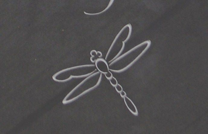 dragonfly symbol headstone