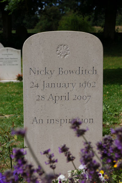traditional headstone with carving of Tudor Rose